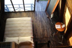 a living room with a couch and a table at Cabañas Hacienda de Letras in San Luis de Letras