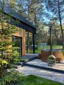 Κήπος έξω από το Chata w Puszczy Nowa Łuka