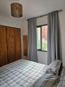 Postel nebo postele na pokoji v ubytování Luminoso departamento