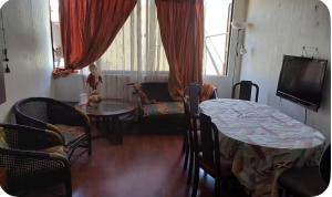 Posezení v ubytování Centrico a pasos de la playa