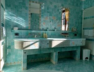 Ένα μπάνιο στο Family rooms with full kitchen in Lake Garda +45 φωτογραφίες