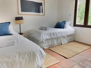 Ένα ή περισσότερα κρεβάτια σε δωμάτιο στο Casapueblo Rent Cachagua CP 32 +20 φωτογραφίες