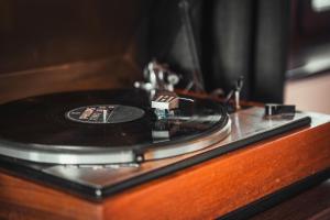 a vinyl record sitting on top of a table at Balaton Cottage - Your Hide Away in Cserszegtomaj +118 photos