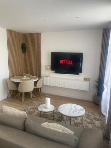 Χώρος καθιστικού στο Appartement Jacuzzi proche Cité Gastronomique