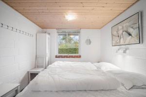 Ένα ή περισσότερα κρεβάτια σε δωμάτιο στο LL259-Humble-Slavaenget-12