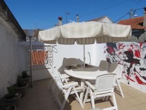 Um ptio ou outra rea exterior em Casa do O - Alojamento Local