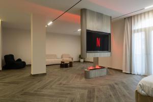 TV a/nebo společenská místnost v ubytování Hayah Inn Cairo - Rehab City