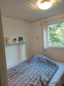 Ένα ή περισσότερα κρεβάτια σε δωμάτιο στο HAL112-Hishult-Hoegaholma-42