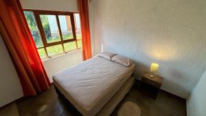 Ένα ή περισσότερα κρεβάτια σε δωμάτιο στο Casa Huerta Vista Bonita +13 φωτογραφίες