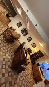 a view of a living room with a couch on the floor at Casa Mario 1 in Drobeta-Turnu Severin