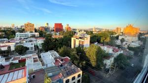 een luchtfoto van een stad met gebouwen bij 06 Loft Espectacular - Aire Acondicionado, Consulado in Guadalajara