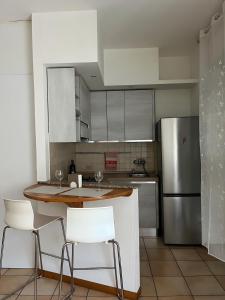 Η κουζίνα ή μικρή κουζίνα στο Cozy studio in Bovisa, close to Tram bus and Train