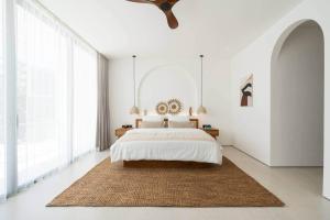 En eller flere senge i et værelse på Elements Villa A2 - Dreamland
