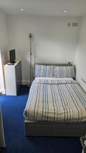 Postel nebo postele na pokoji v ubytování Restful Place