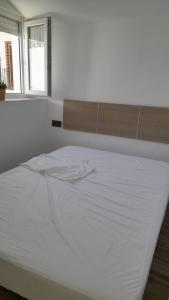 Postel nebo postele na pokoji v ubytování La casita