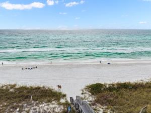 a view of a beach with people and the ocean at Inlet Beach Reunion House by 30A Escapes in Inlet Beach