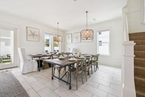 a dining room with a table and chairs at Inlet Beach Reunion House by 30A Escapes in Inlet Beach +41 photos