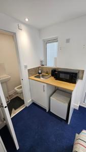 Kuchyň nebo kuchyňský kout v ubytování Restful Place + 5 fotografií