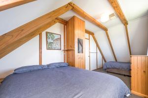 a bedroom with a large bed in a house at Ocean Vista Large Modern Home With Ocean Views in Guilderton