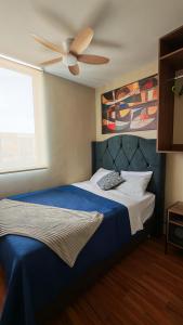 Giường trong phòng chung tại Apartament ARICEL