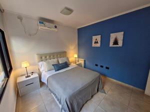 Postel nebo postele na pokoji v ubytování Departamento VCP Costanera + 28 fotografií