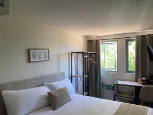 Postel nebo postele na pokoji v ubytování Casa Marina