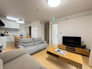 Køkken eller tekøkken på Guesthouseとき2