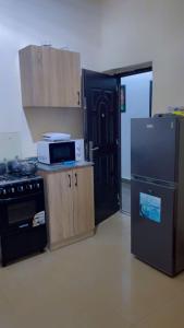 Afbeelding uit fotogalerij van Benny rose apartment in Abuja +23 foto's