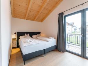 Ένα ή περισσότερα κρεβάτια σε δωμάτιο στο Obermöschach 5A