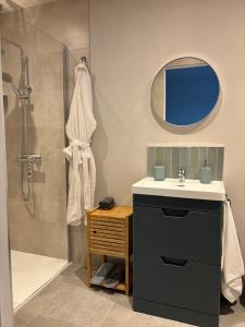 a bathroom with a sink and a shower at apartment cavan in Cavan +13 photos