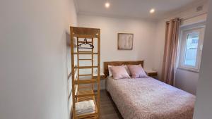 Ένα ή περισσότερα κρεβάτια σε δωμάτιο στο Charming Baixa VII - 1 Room APT