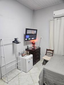 Μια τηλεόραση ή/και κέντρο ψυχαγωγίας στο Terraço sol e lua