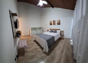 Postel nebo postele na pokoji v ubytování Suítes Vila das Ondas Búzios