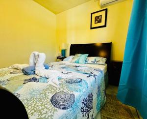 Ένα ή περισσότερα κρεβάτια σε δωμάτιο στο Seaview Escape Tobago