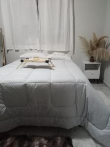 Ένα ή περισσότερα κρεβάτια σε δωμάτιο στο Pousada São Jorge