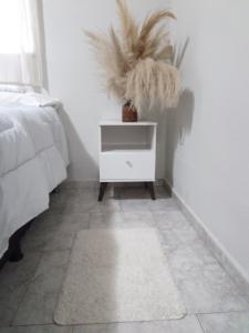 Ένα ή περισσότερα κρεβάτια σε δωμάτιο στο Pousada São Jorge +1 φωτογραφίες