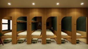 Postel nebo postele na pokoji v ubytování Stay Ohana + 5 fotografií