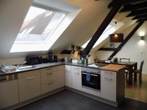 Kuchyň nebo kuchyňský kout v ubytování Urban Living unter den Dächern der Göttinger Altstadt + 79 fotografií