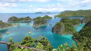a view of a bay with limestone islands in the water at Sau Baryam in Fam +18 photos