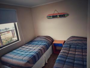 Postel nebo postele na pokoji v ubytování Vista de Lobos - Casa de Playa