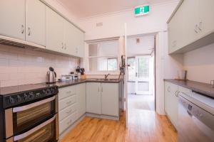 A kitchen or kitchenette at Jones On Wilson Boutique B&B