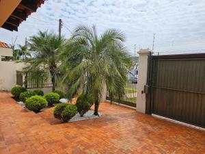Zahrada ubytování Quarto Shanti para viajantes em Dourados.