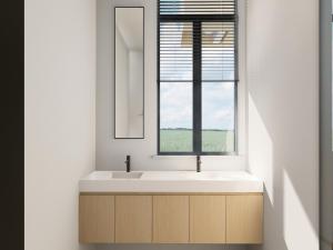 a bathroom with a sink and a window at Spacious 3-Floor Holiday Home for 8 Guests in Bree +5 photos