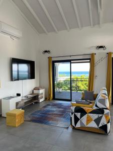 Posezení v ubytování Vue Mer Panoramique, Grande Terrasse Privée, Plage à 10 Min