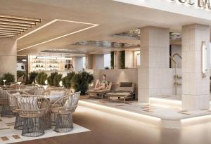 a rendering of a lobby with chairs and a woman at Harmony Saigon Hotel & Spa in Ho Chi Minh City