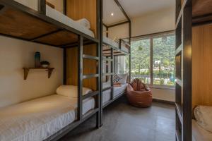 Ένα ή περισσότερα κρεβάτια σε δωμάτιο στο PACK Rishikesh, Mohanchatti +43 φωτογραφίες