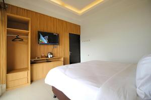 TV a/nebo společenská místnost v ubytování Sabda Alam Agro & Farmstay