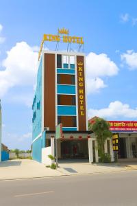 a building with a sign on top of it at King Hotel Hải Phòng in Hai Phong +40 photos
