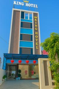 a hotel with a sign on the front of it at King Hotel Hải Phòng in Hai Phong