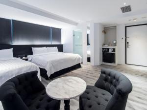 Katil atau katil-katil dalam bilik di Hotel Relax III
